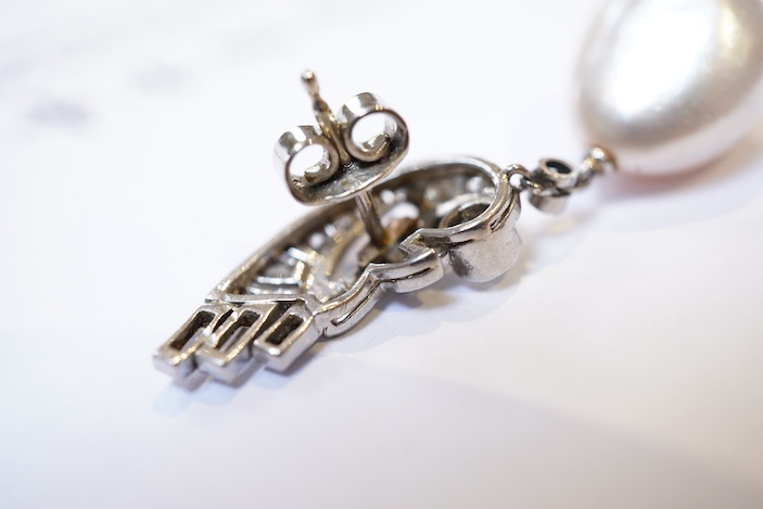 A fine pair of Art Deco natural pearl and diamond earrings, 1930s